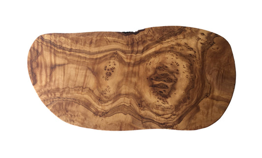 Hand-shaped live edge olive wood cutting board, natural grain, white background